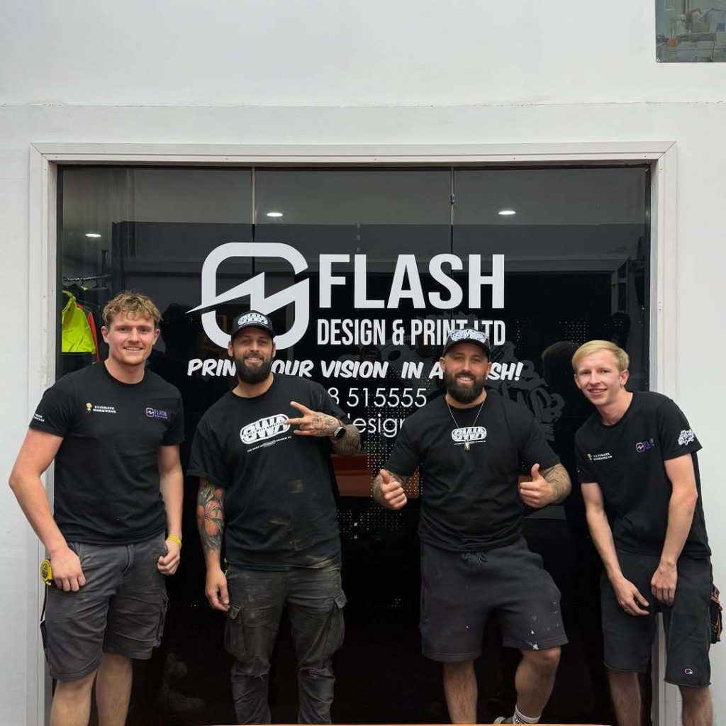 The Flash Design & Print team in branded t-shirts