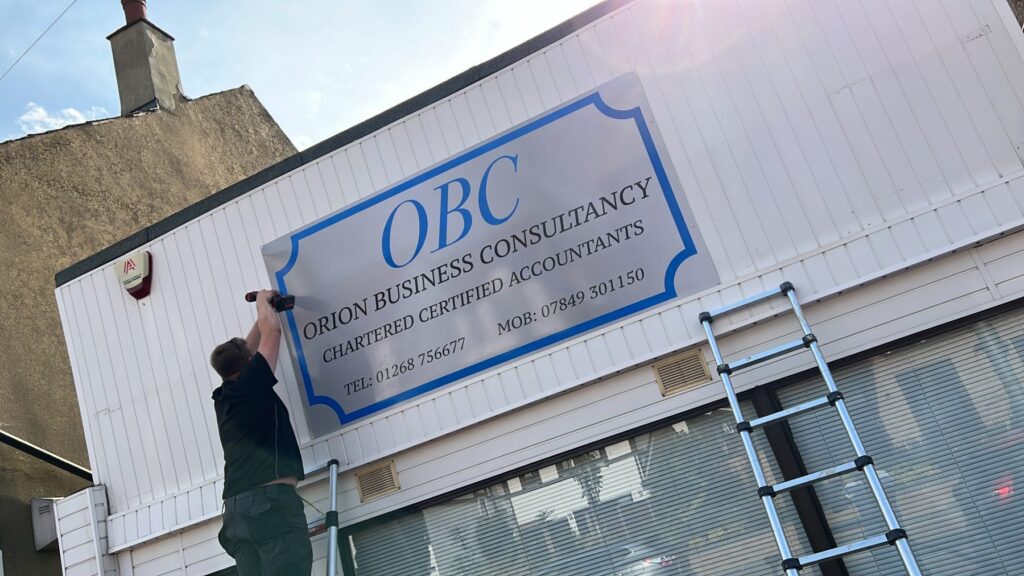 Flash Design & Print fitting an ACM sign for Orion Business Consultancy