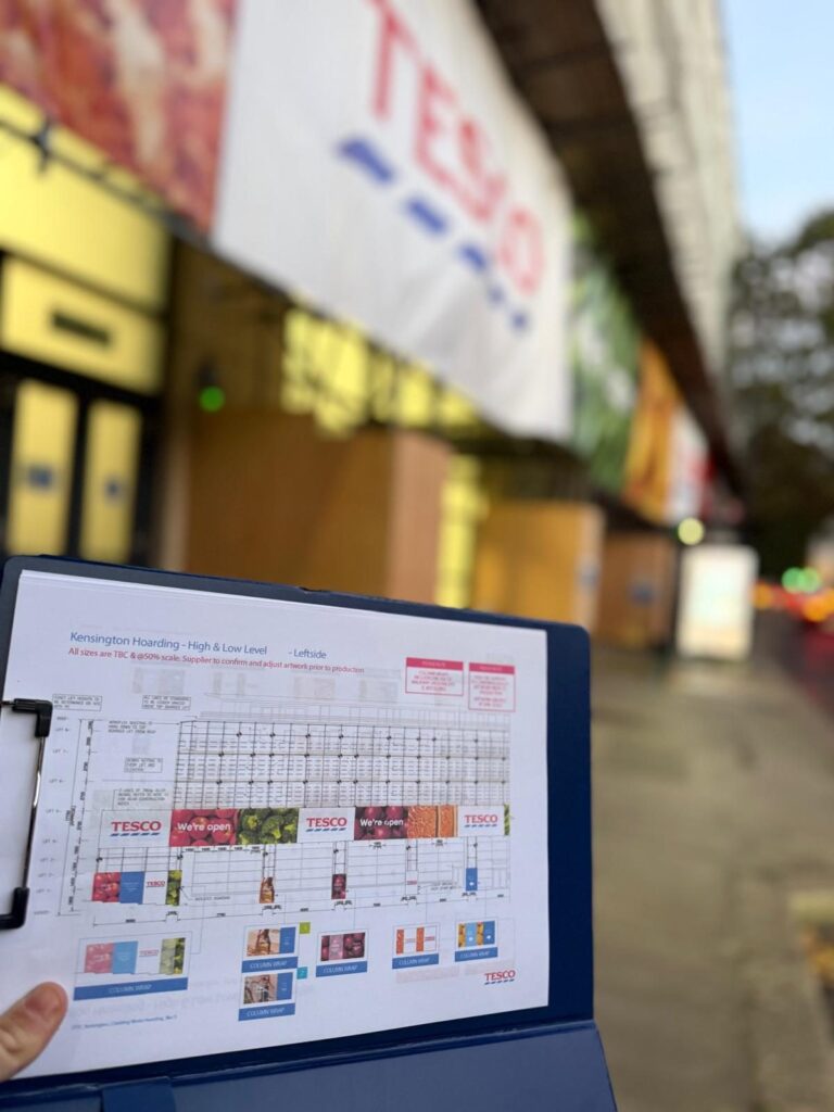 Tesco scaffold banner plan checked on site