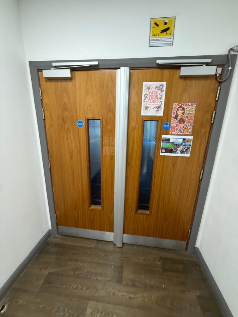 Sports hall doors before the wrap